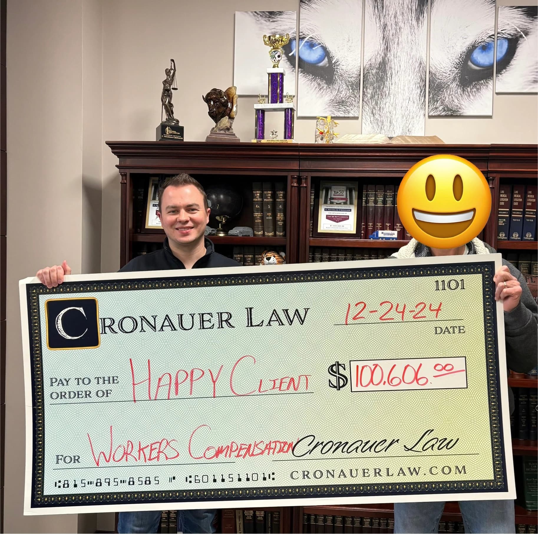 Cronauer Law client receiving settlement check