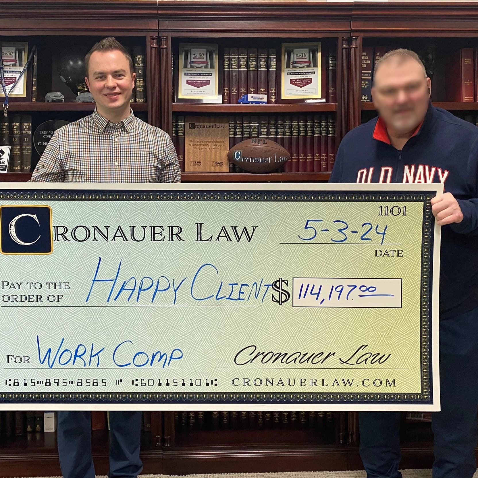 Cronauer Law client receiving settlement check