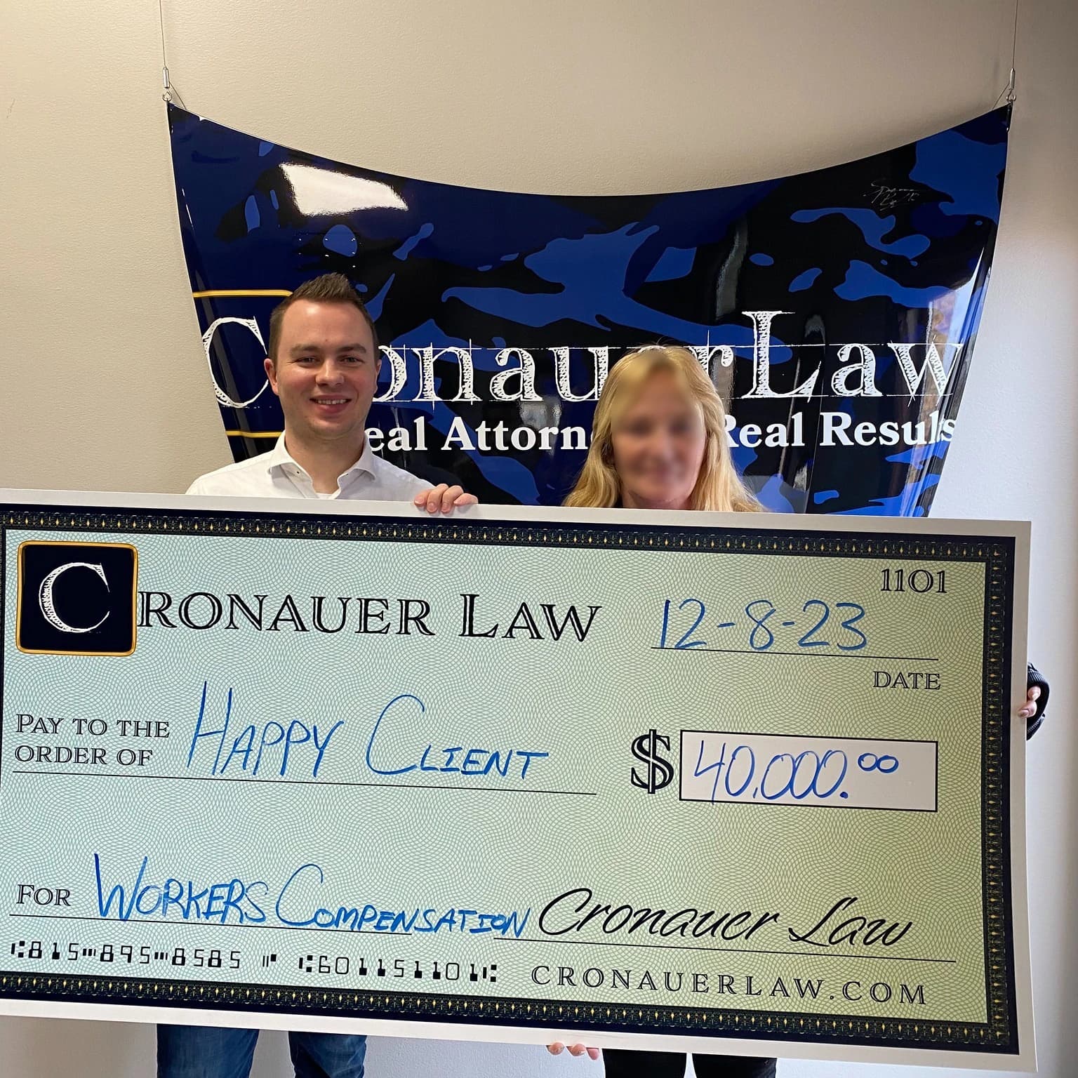 Cronauer Law client receiving settlement check