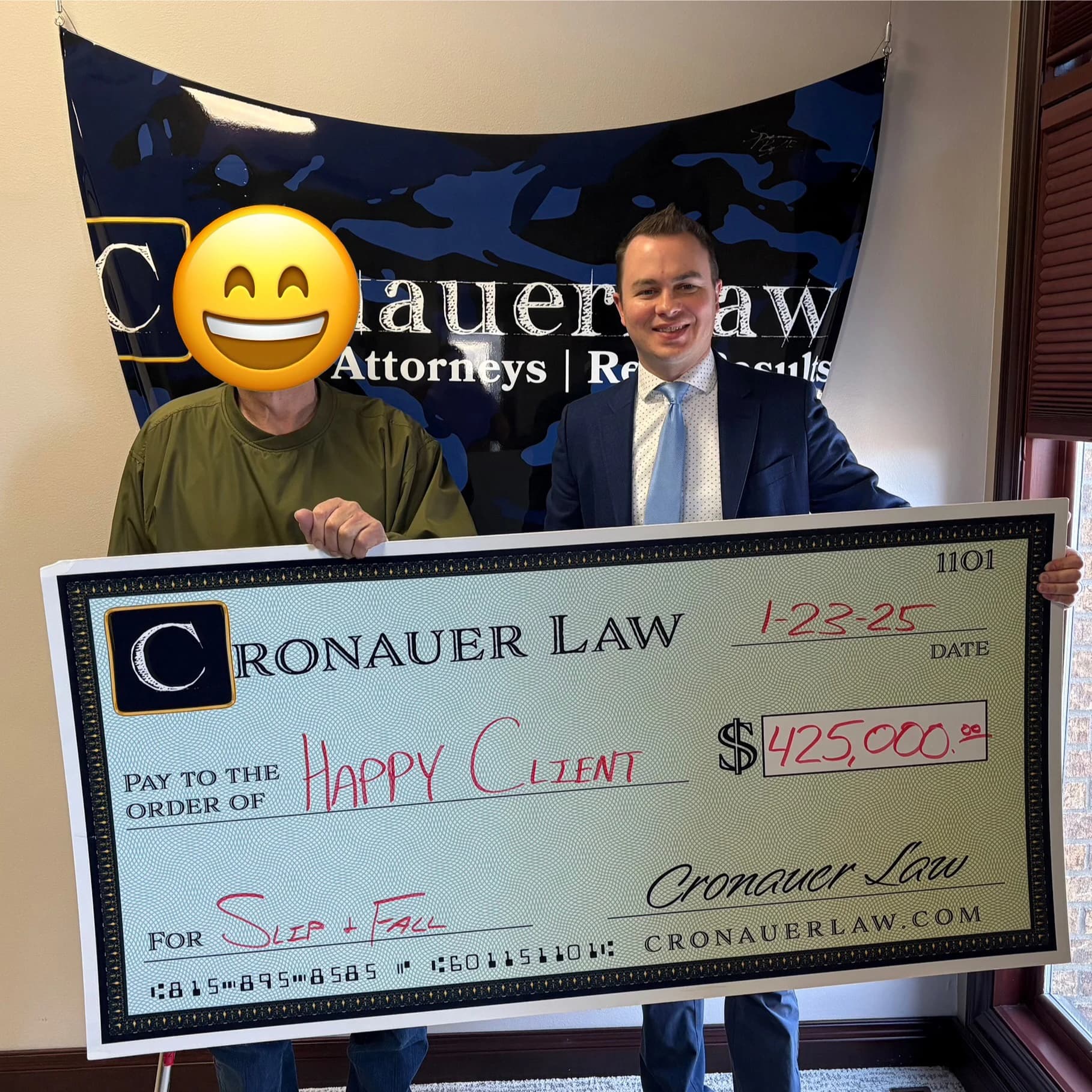 Cronauer Law client receiving settlement check