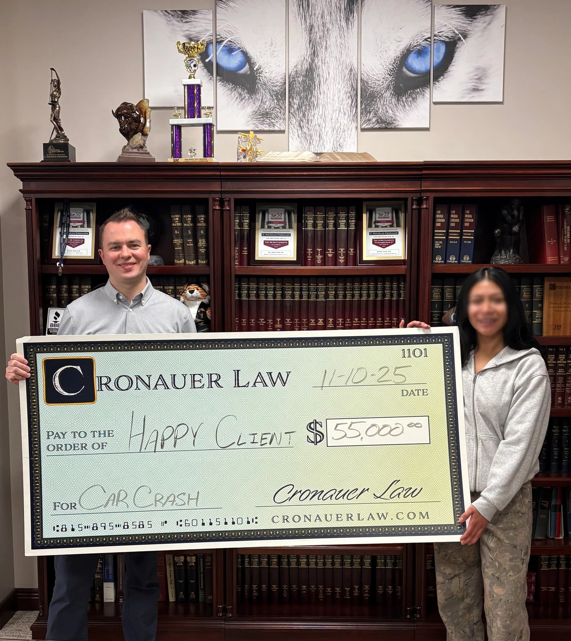 Cronauer Law client receiving settlement check