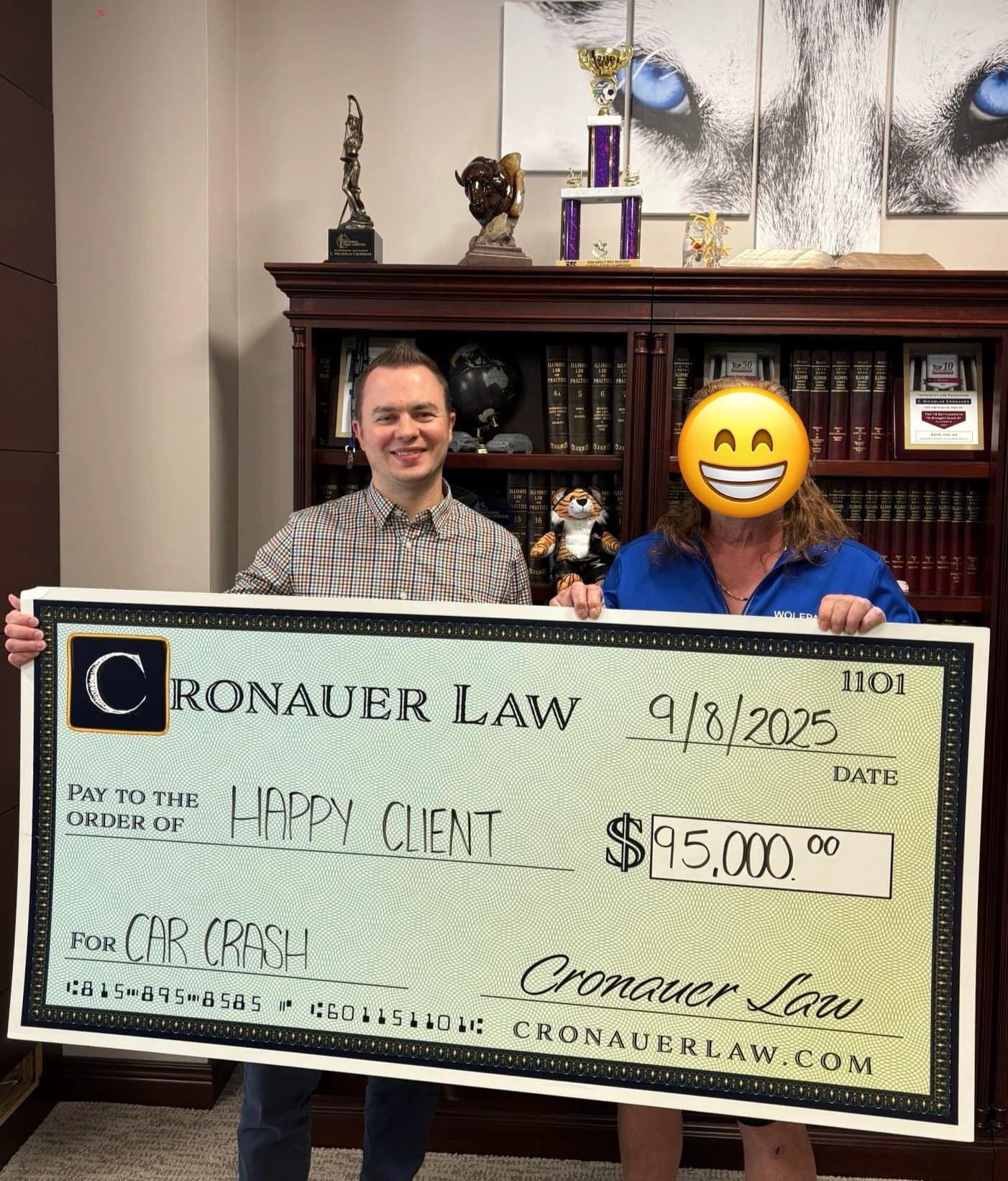 Cronauer Law client receiving settlement check