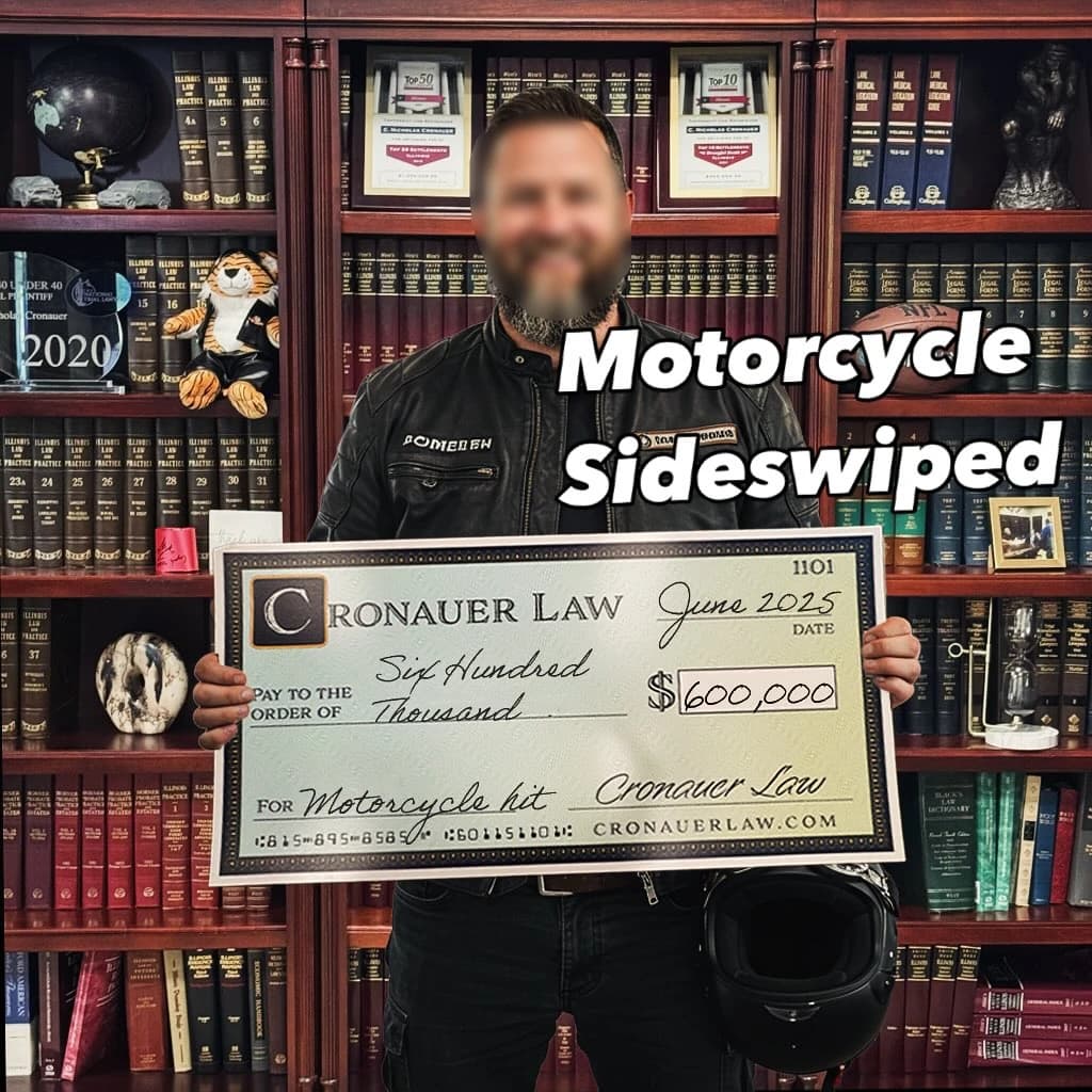 Cronauer Law client receiving settlement check