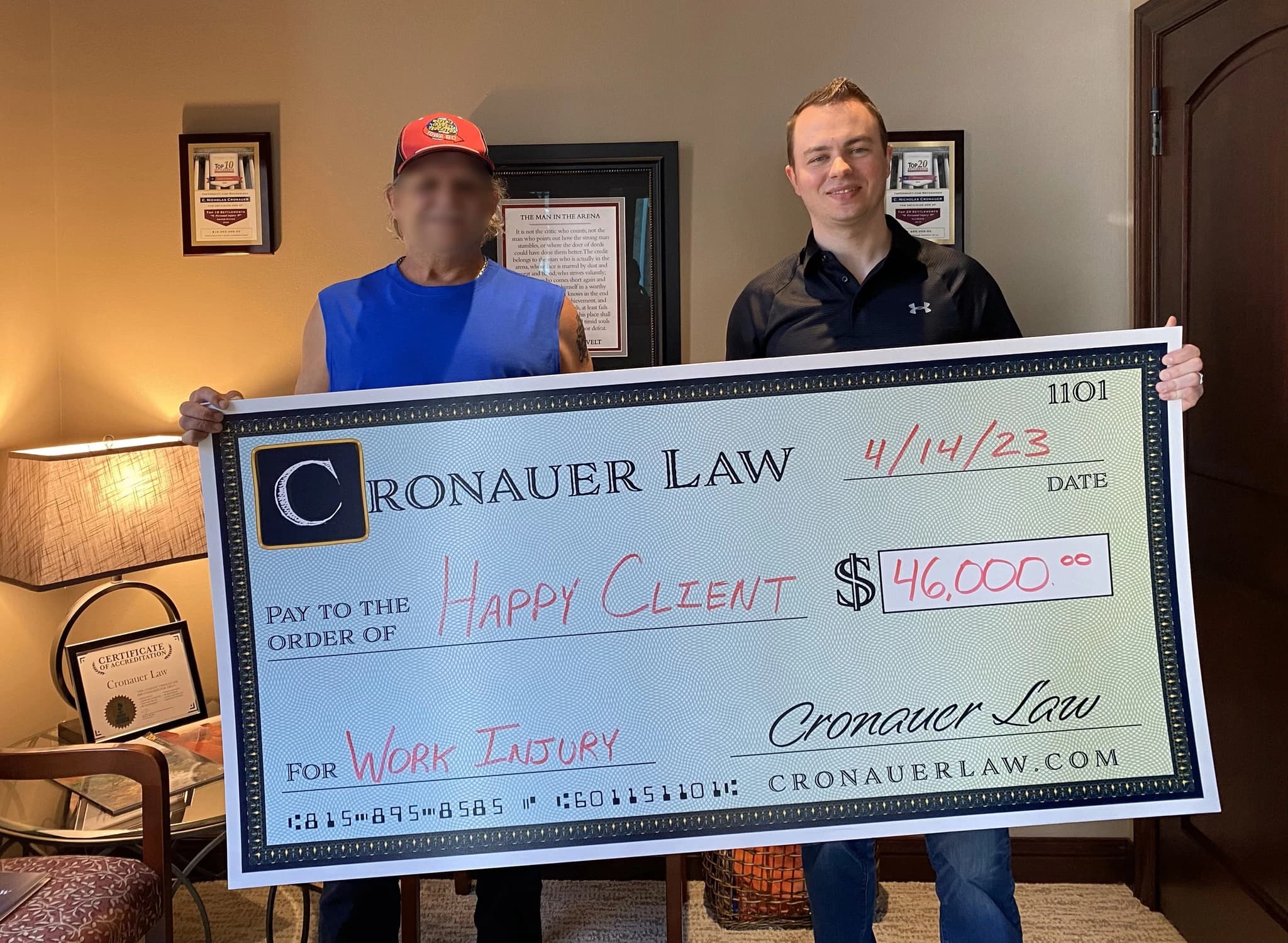 Cronauer Law client receiving settlement check