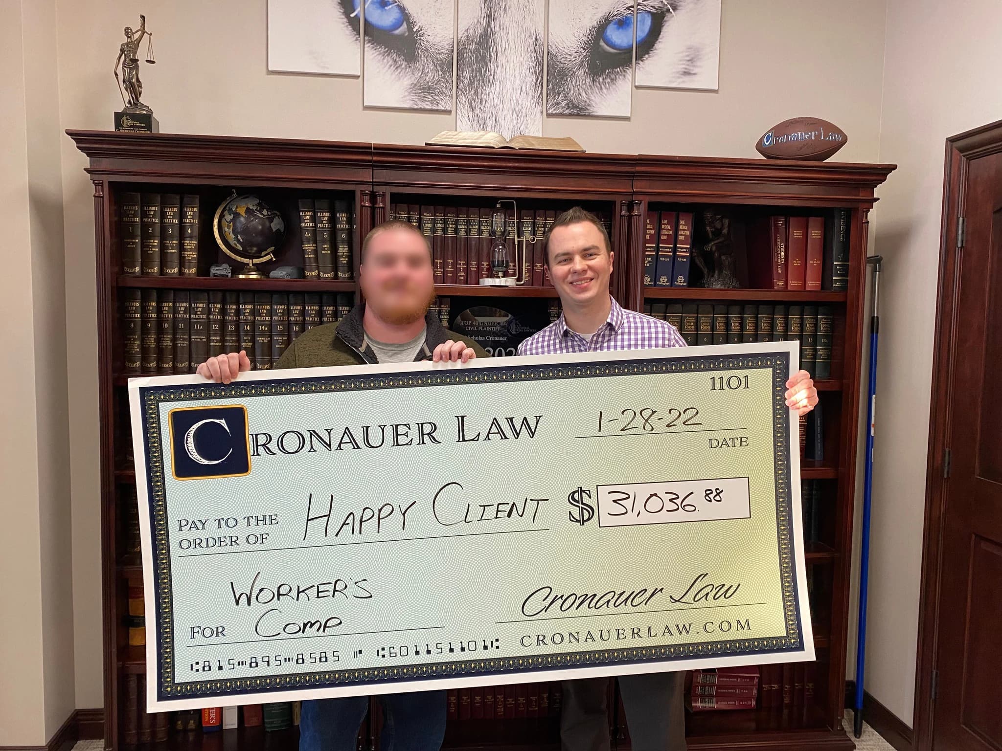 Cronauer Law client receiving settlement check