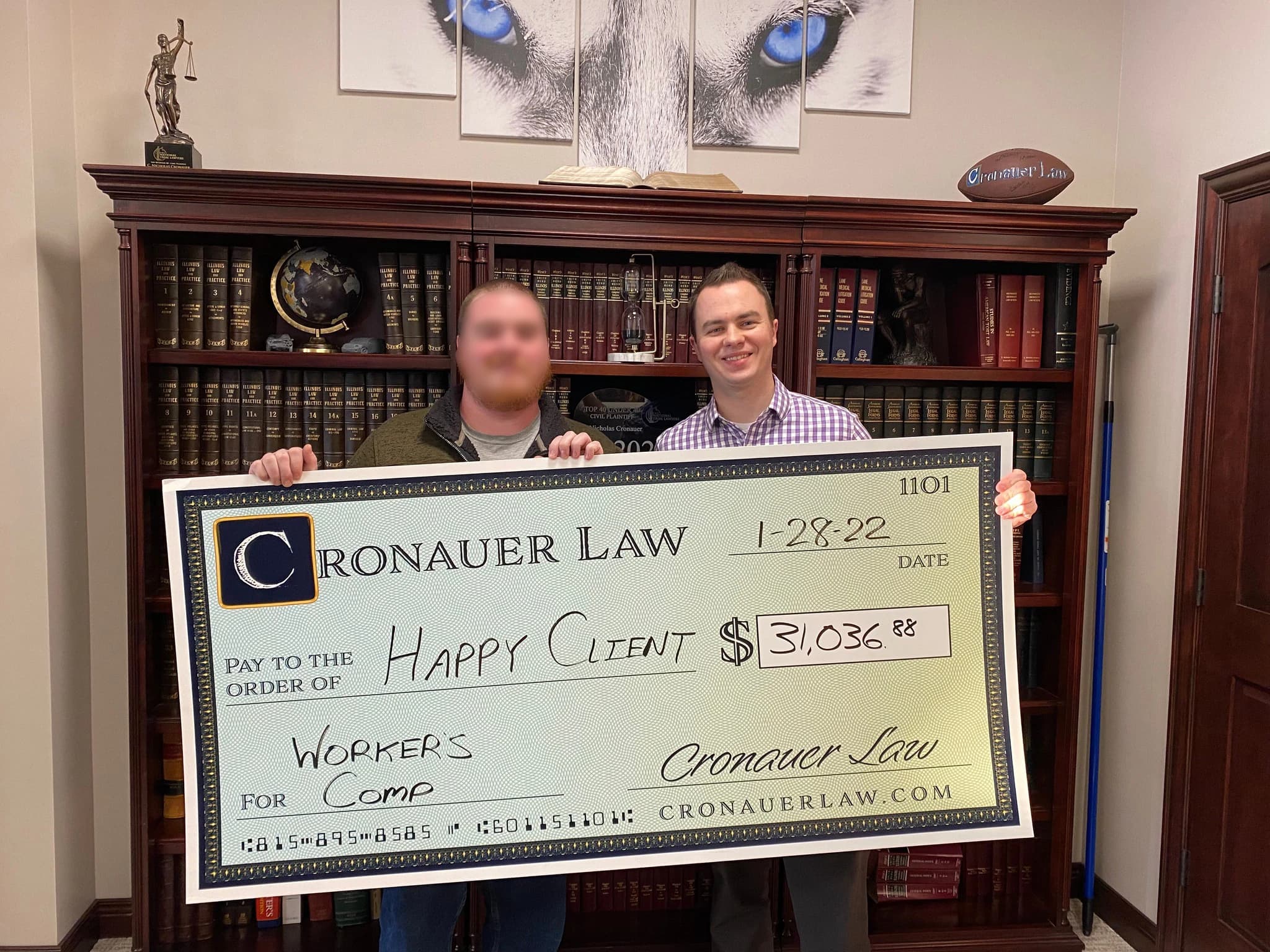 Cronauer Law client receiving settlement check