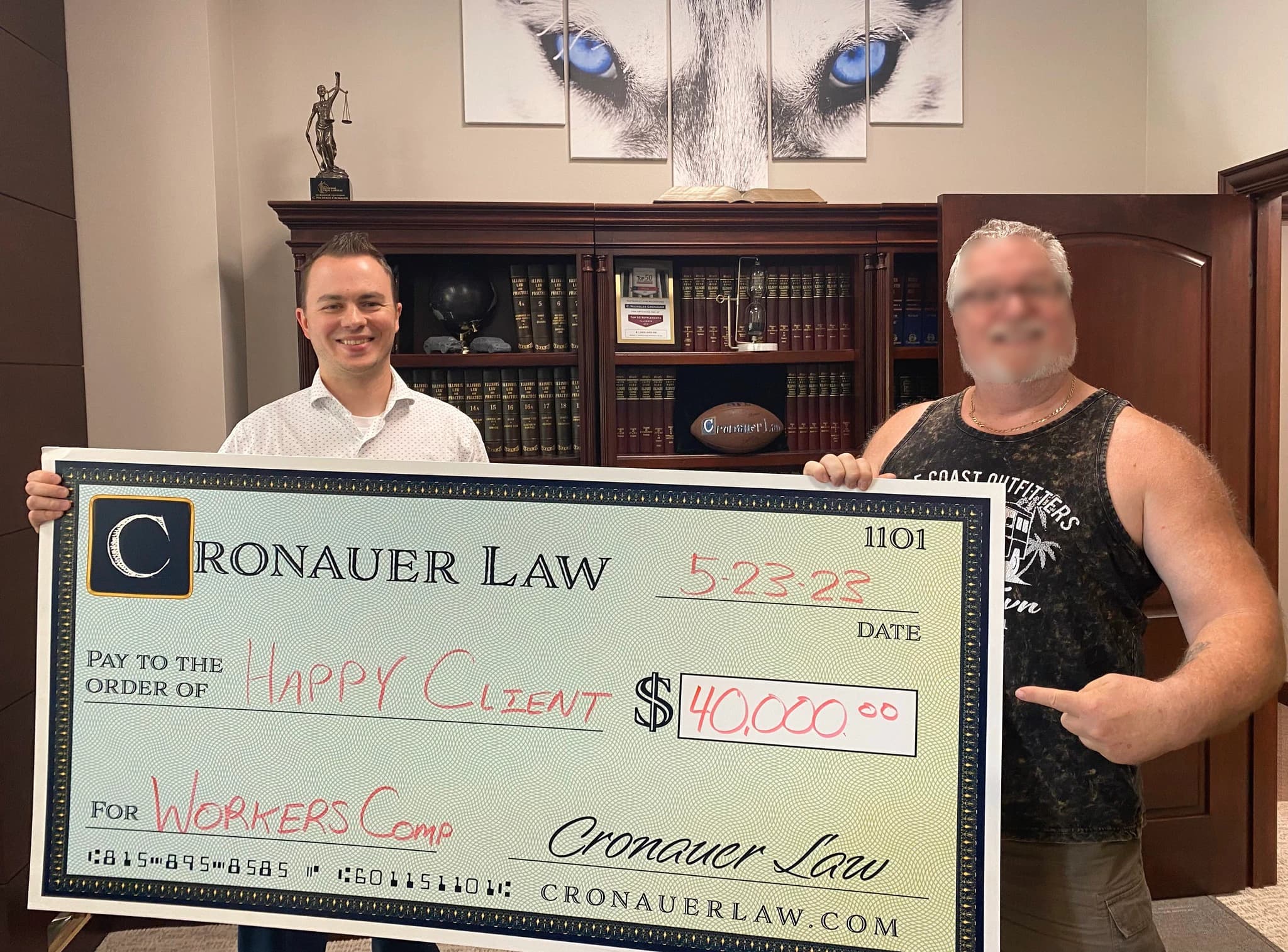 Cronauer Law client receiving settlement check