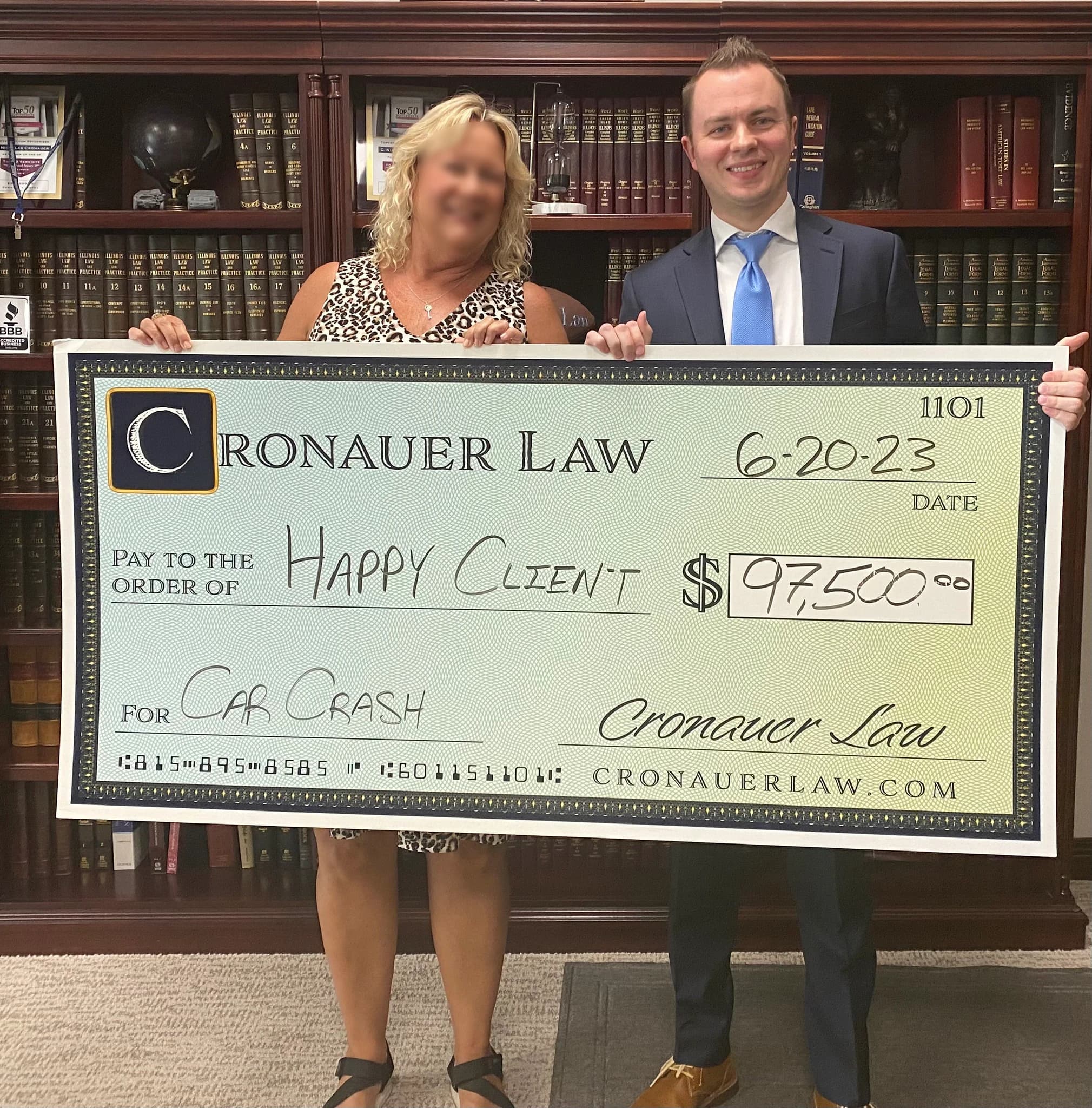 Cronauer Law client receiving settlement check