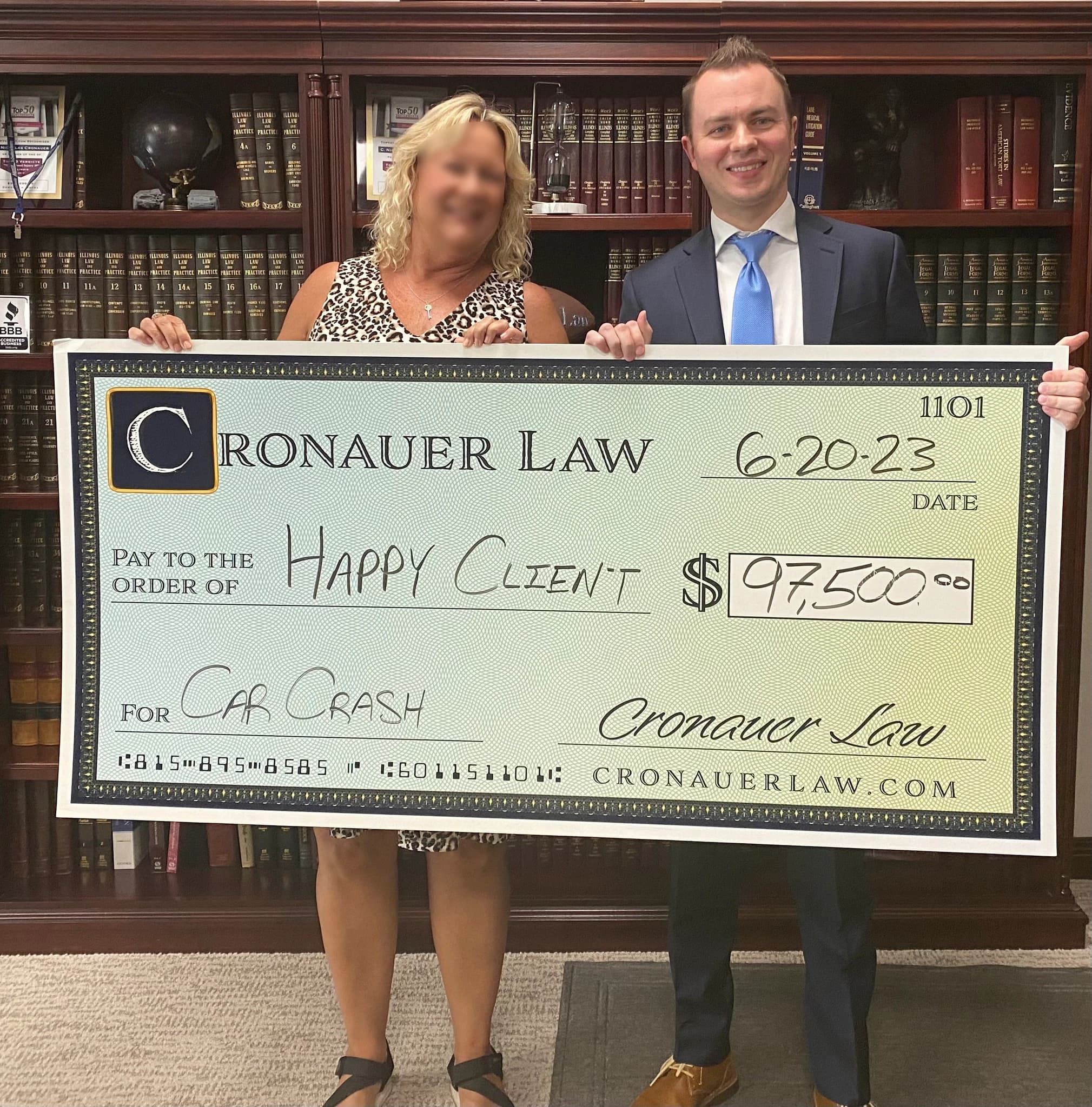 Cronauer Law client receiving settlement check