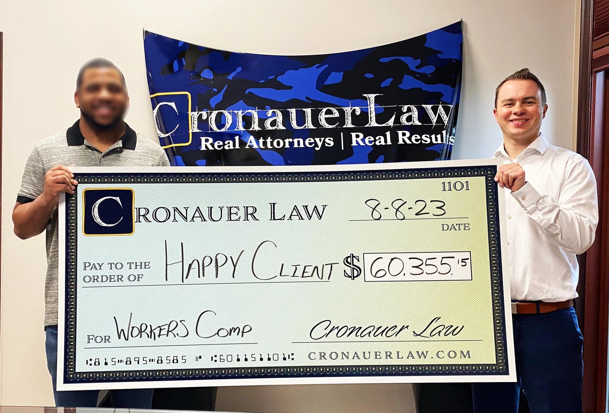 Cronauer Law client receiving settlement check