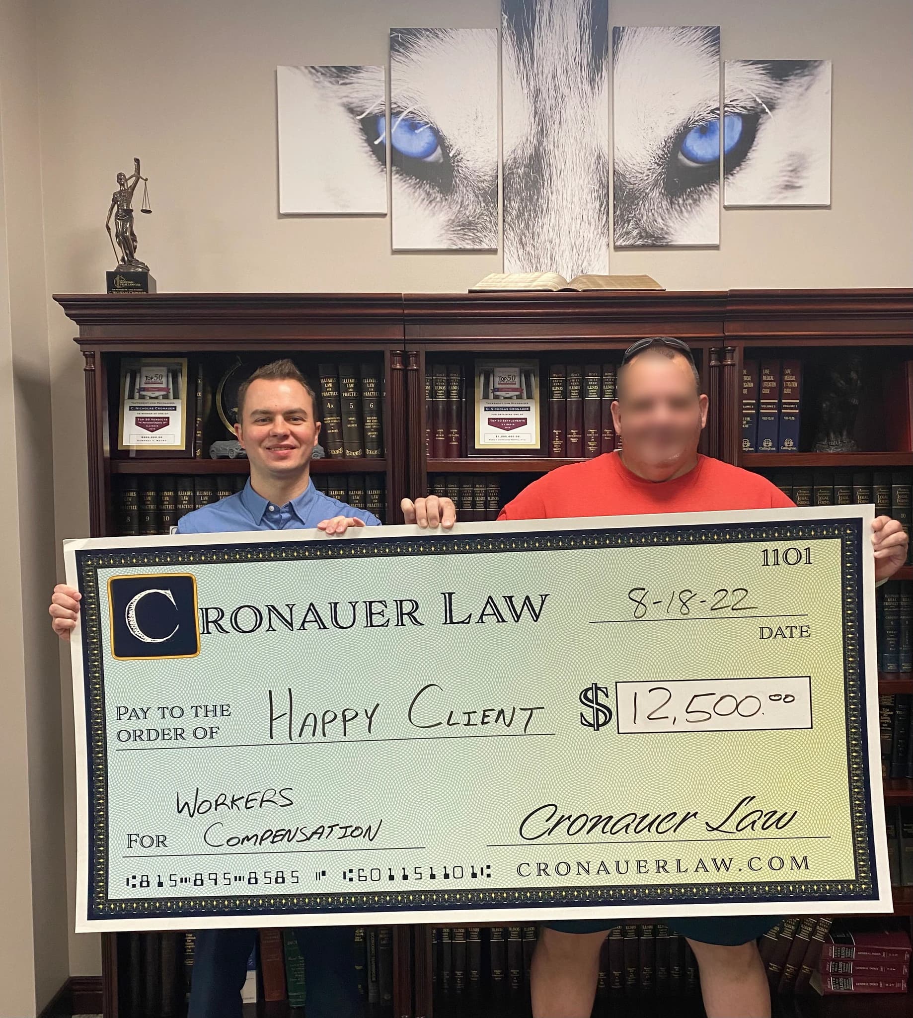Cronauer Law client receiving settlement check